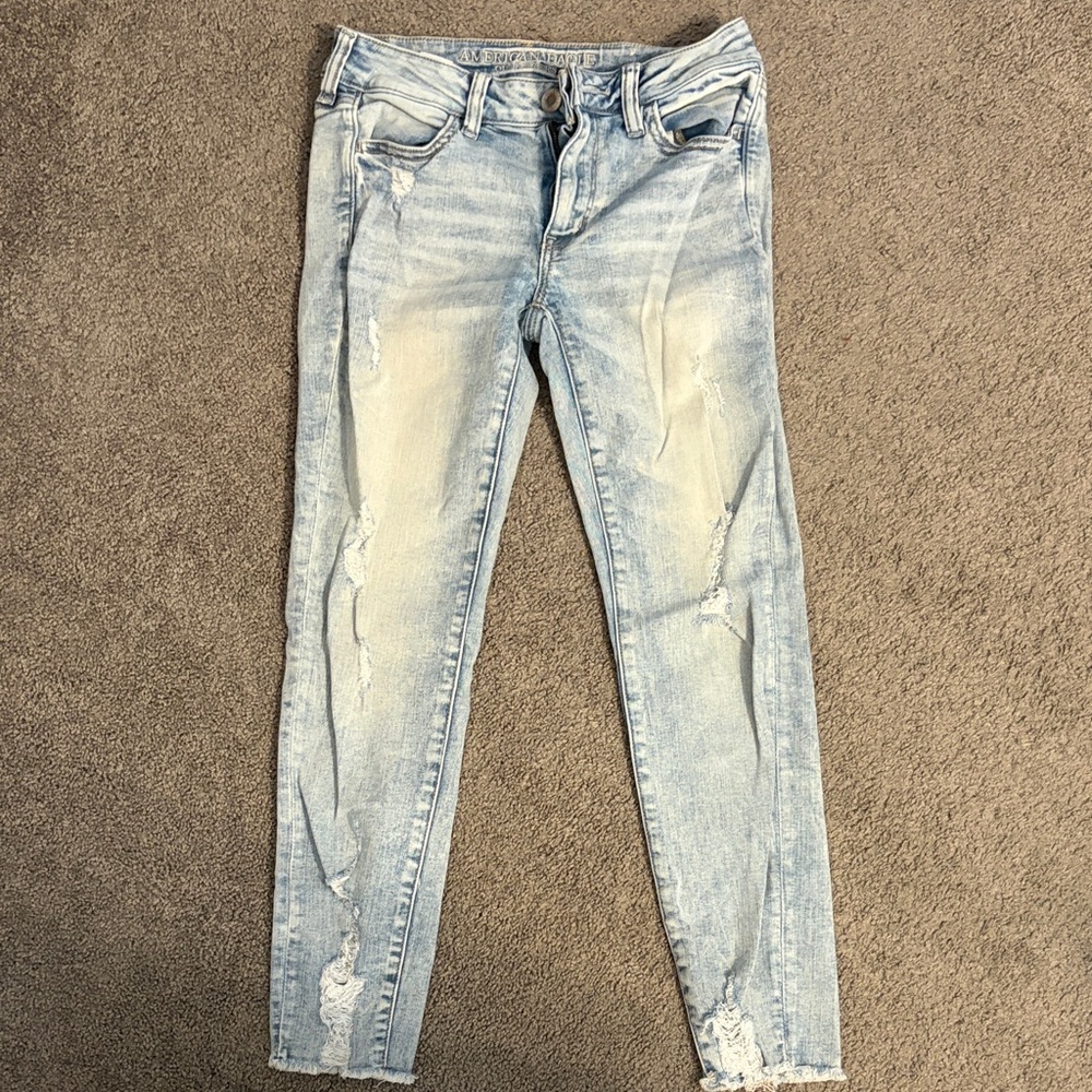 American Eagle - next level stretch Stylish Light Blue Distressed jeans - size 6